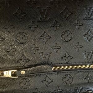 Louis Vuitton Black Embossed Monogram Wristlet